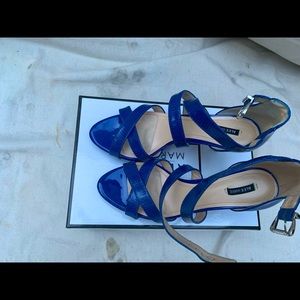 Barely worn Appx 4.5 inch. Leather strapped high heel sandal